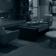 Member lounge area and fireplace at FFC Elmhurst.