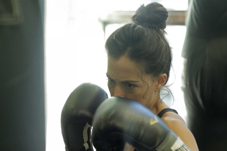 Woman with boxing gloves on