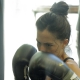 Woman with boxing gloves on