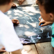 Kids drawing with chalk