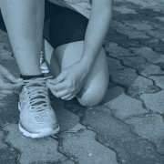 Runner tying shoelaces.