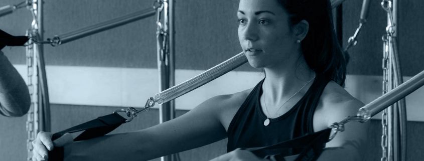 Pilates apparatus student.