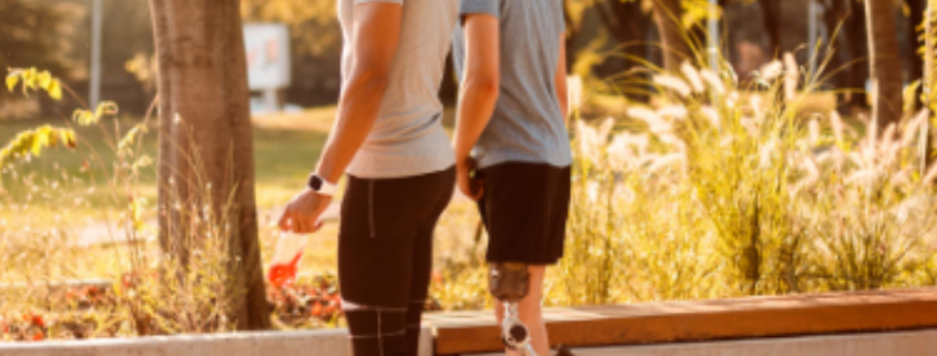 Two men walking in the forest