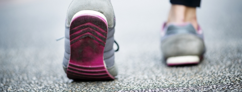 Woman walking on a road