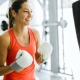 Young woman boxing and training in a gym