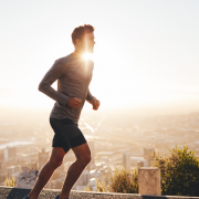 Man running outside in the sunshine