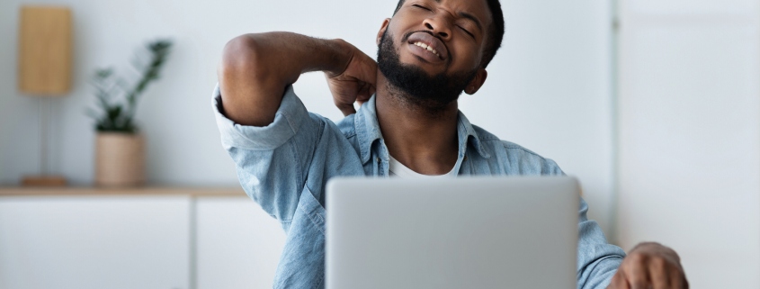 Golf ball on tee with blue sky above