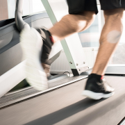 man running on treadmill