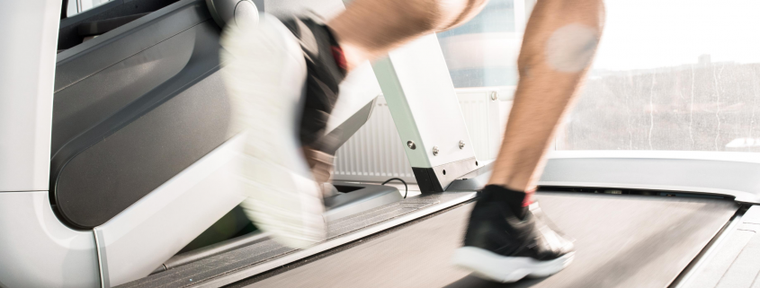 man running on treadmill