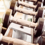 Photo of dumbbells on a weight rack
