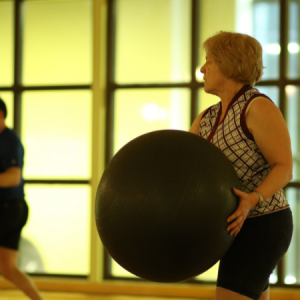 Woman in a Body Work 360 group fitness class in Chicago