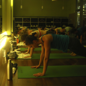 Women in plank position in a Core94 group fitness class in Chicago