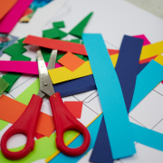 Collection of kids crafting supplies on a table.