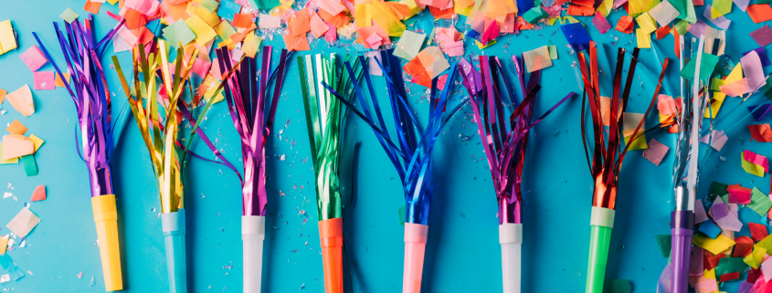 Party noise makers and confetti