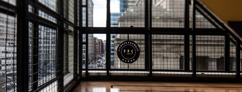 Photo of FFC logo looking to street from interior