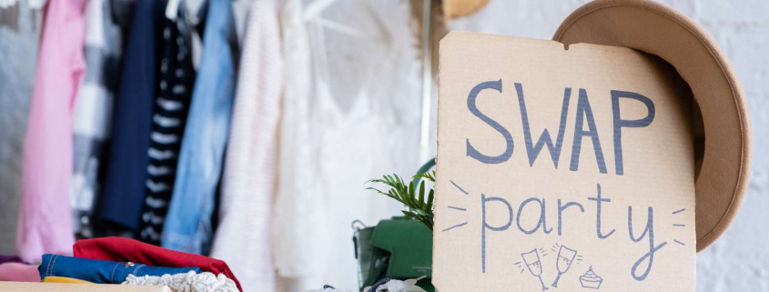 Swap party event with clothes in the background