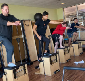A group of men doing pilates at FFC Lincoln Park
