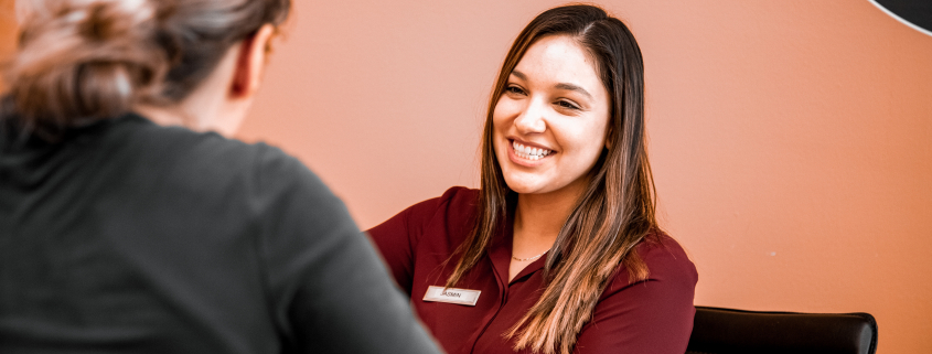 Membership Director smiling at member at Chiago's best gym