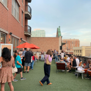 Members hanging out on the outdoor Sundeck at Best Gym in Oak Park.