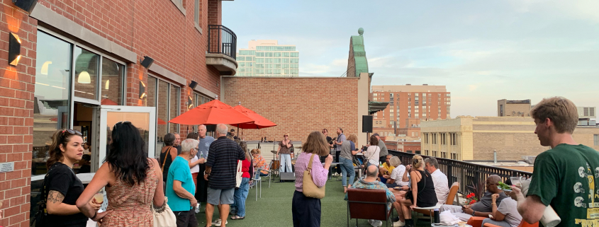 Members hanging out on the outdoor Sundeck at Best Gym in Oak Park.