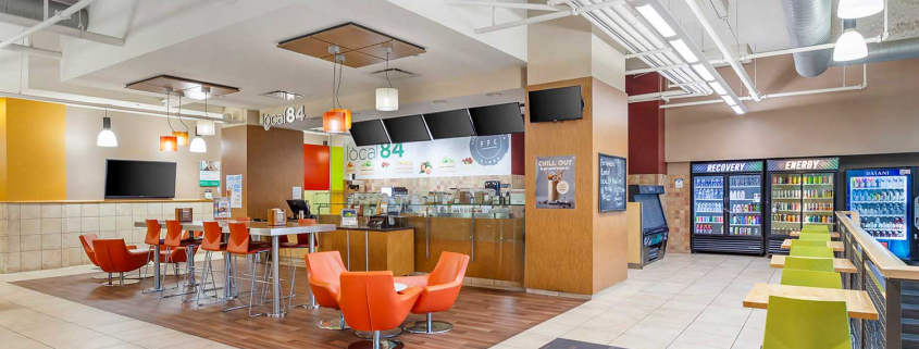 Club Lounge and Cafe with Full-Service Bar, and Seating Area inside Oak Par Gym.