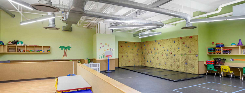 Kids Club with Small Climbing Wall Inside FFC Oak Park Gym.