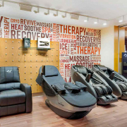Recovery Lounge with Massage Chairs and Cryo Chairs in side FFC Elmhurst Gym.