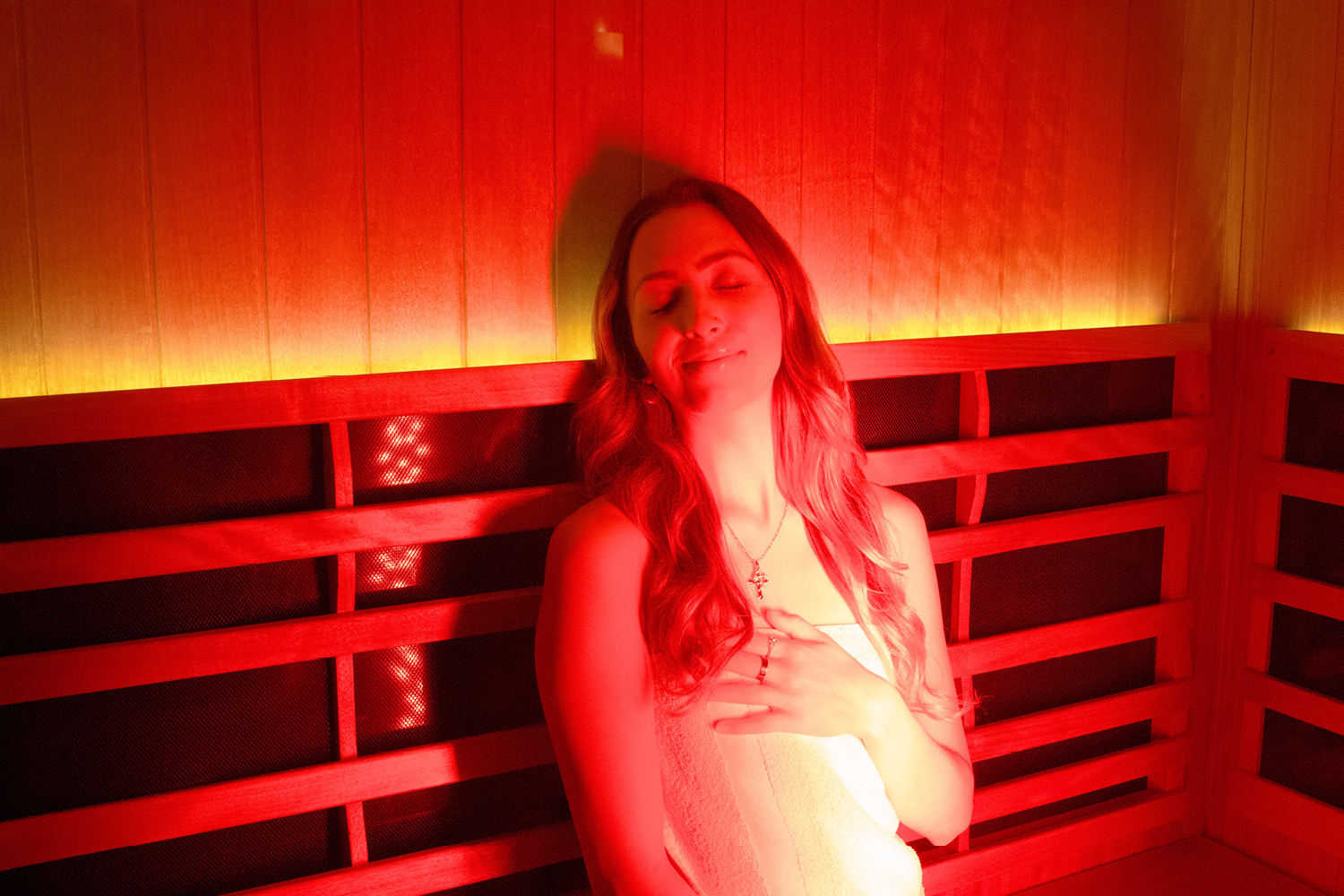 Member relaxing in the infrared sauna at FFC West Loop.jpg