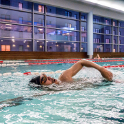 A person participating in the indoor triathlon