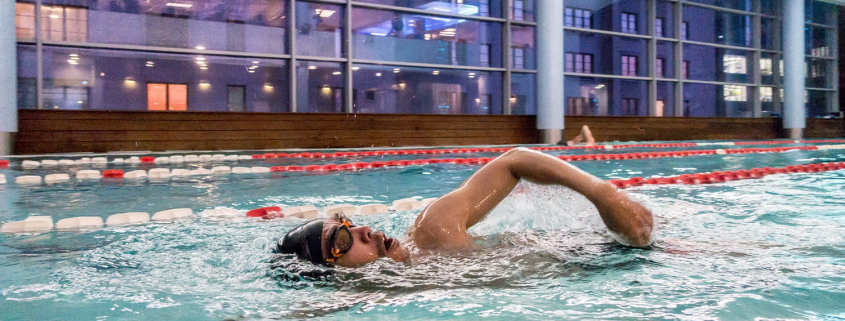 A person participating in the indoor triathlon
