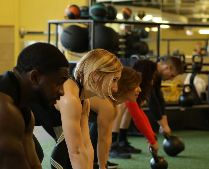 Group of Members Using A Kettlebell to Work Out at FFC Gold Coast.jpg