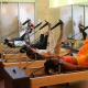 Group of women on pilates reformer at FFC West Loop