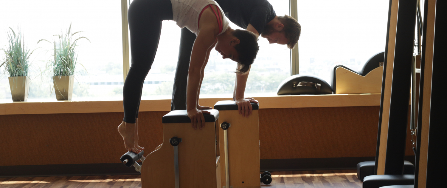 Kristen and Wade on Pilates Chair