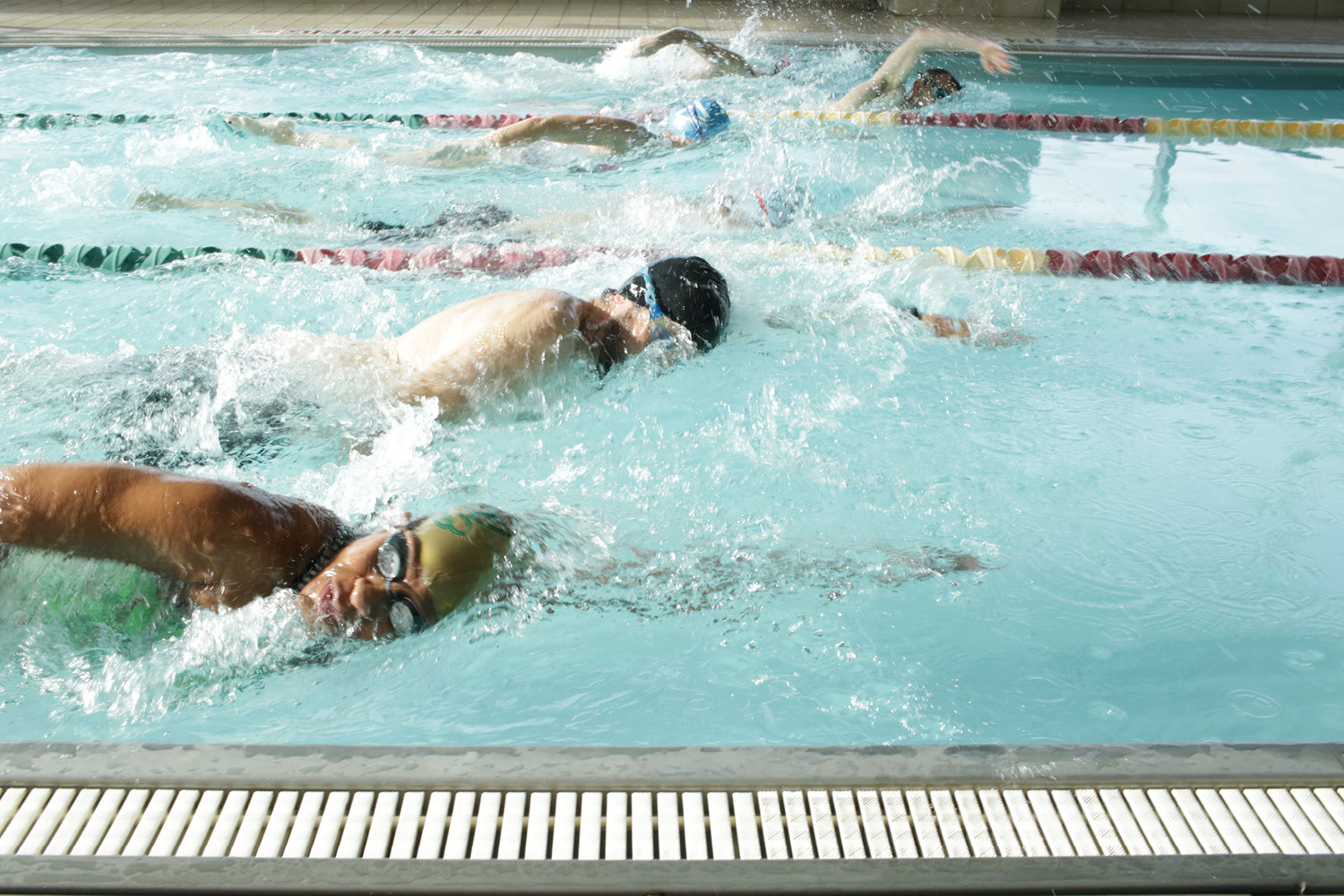 Swimmers at the FFC pool overwater photo