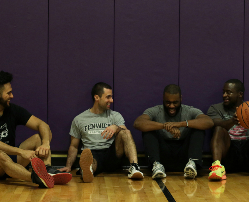 FFC Union Station Members sitting down after a tournament at the Union Station basketball court.