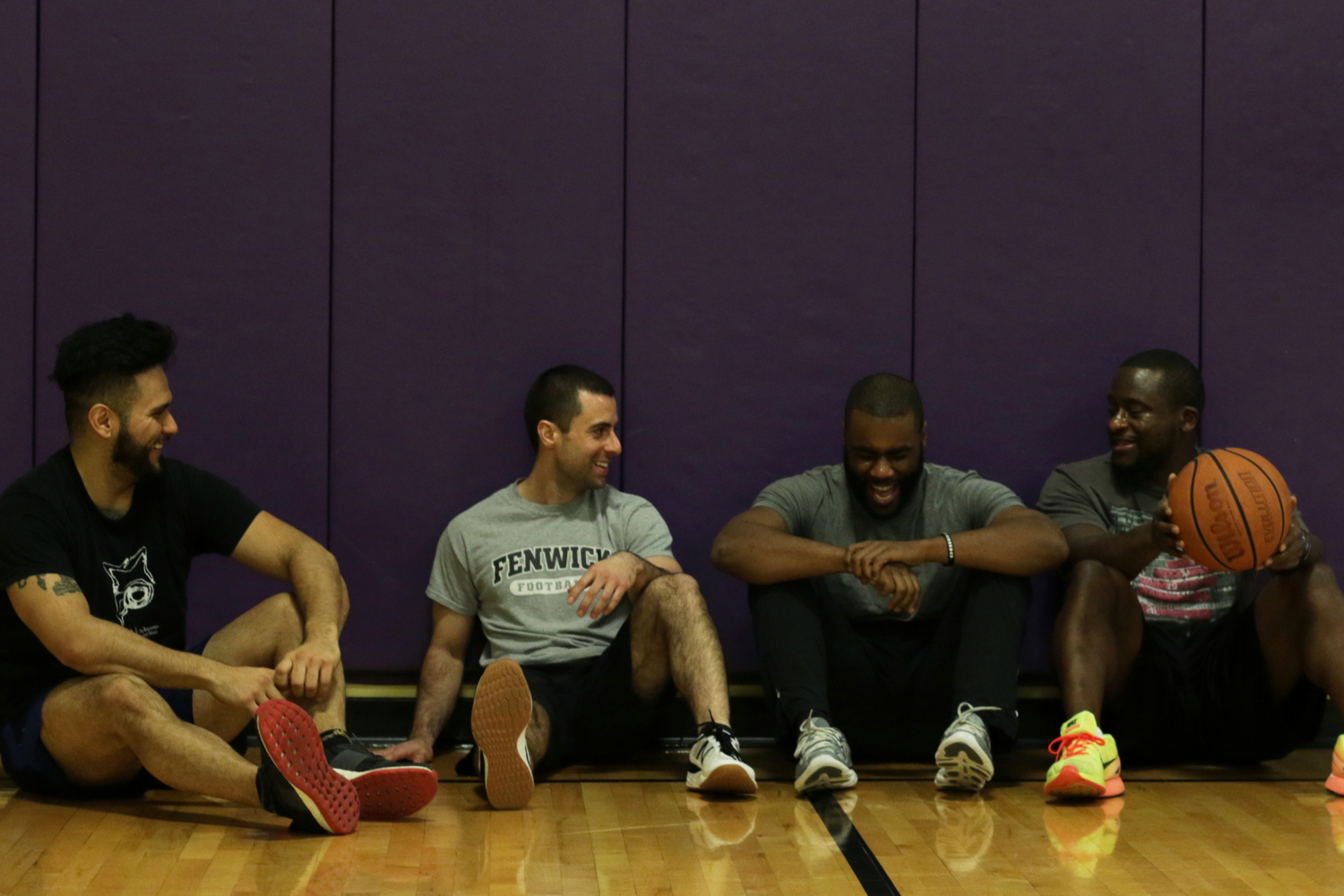 FFC Union Station Members sitting down after a tournament at the Union Station basketball court.