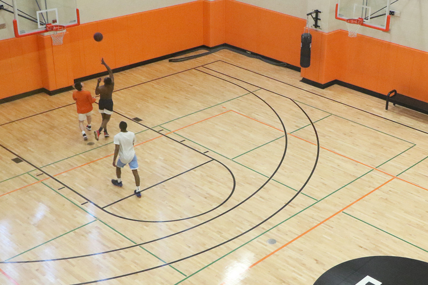 FFC Members playing basketball at the Suburb club location.
